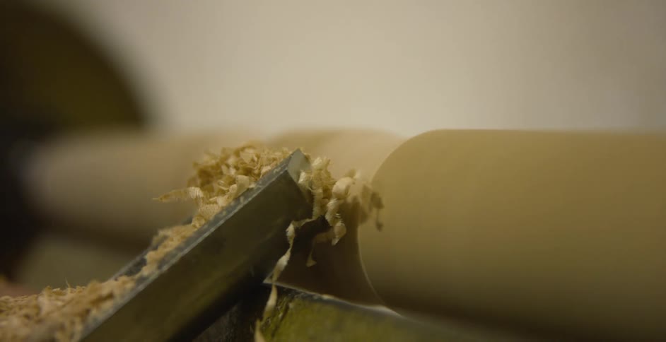 Closeup of a chisel on a lathe