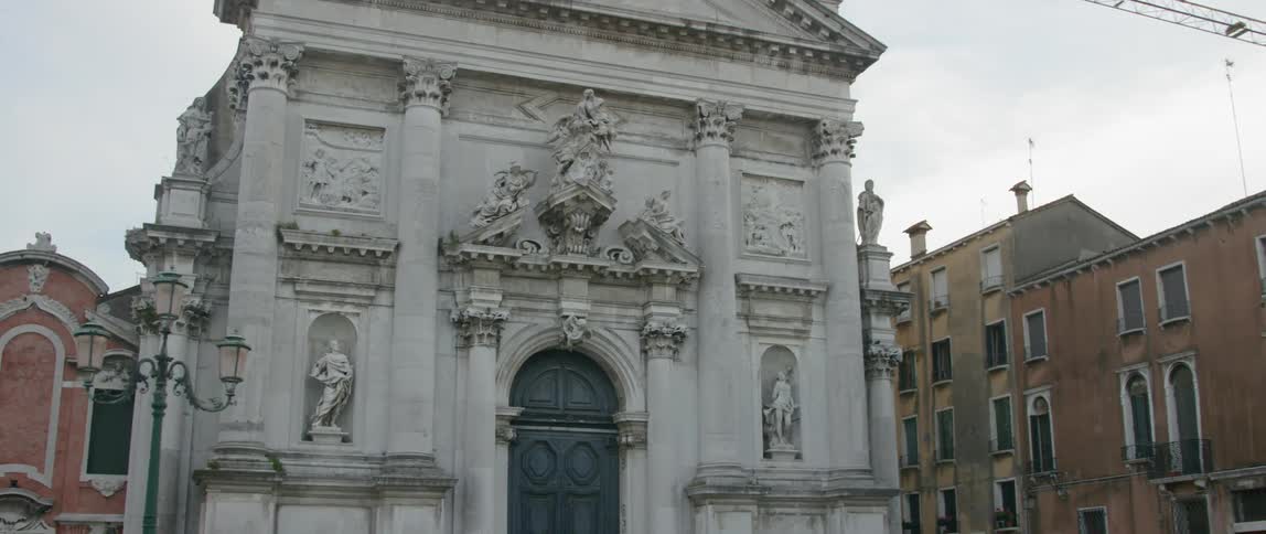 Carved figures cover an ornate building