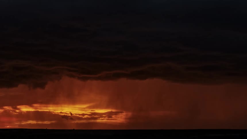 A landscape with a lightning storm the sky and clouds in the background
