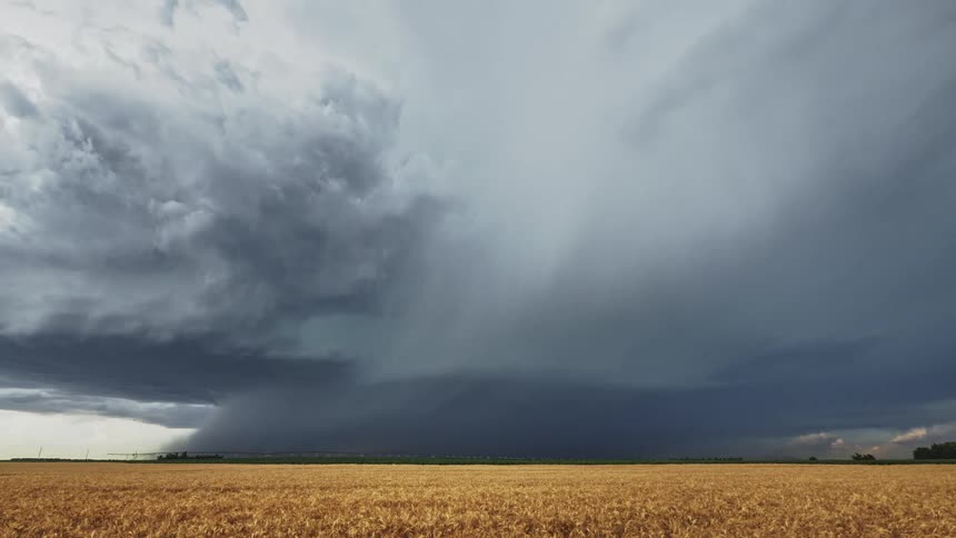 A landscape with a lightning storm the sky and clouds in the background