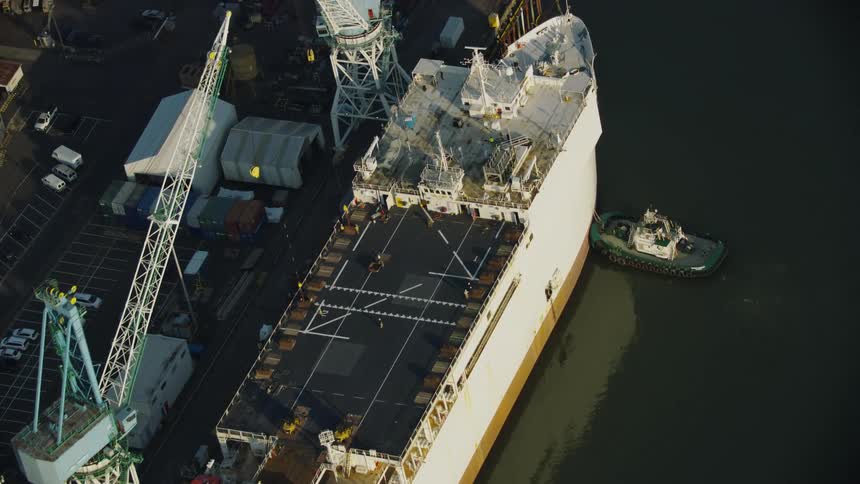 Aerial shot of Military Sealift Command hospital ship USNS Mercy (T-AH 19) at port on the Willamette River near Portland Oregon