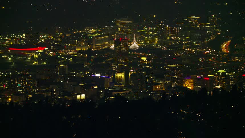 Downtown Portland Oregon skyscrapers and the downtown grid as seen at night from high above the city
