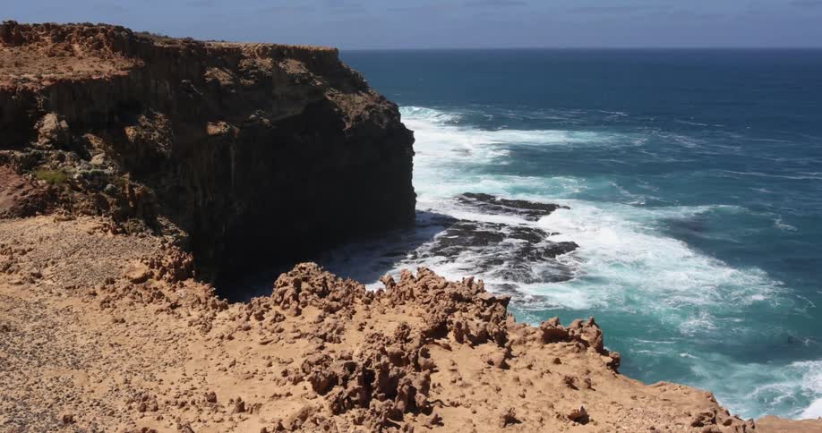 A view of waves crashing against cliffs