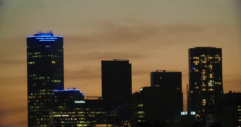 A view of buildings at dusk