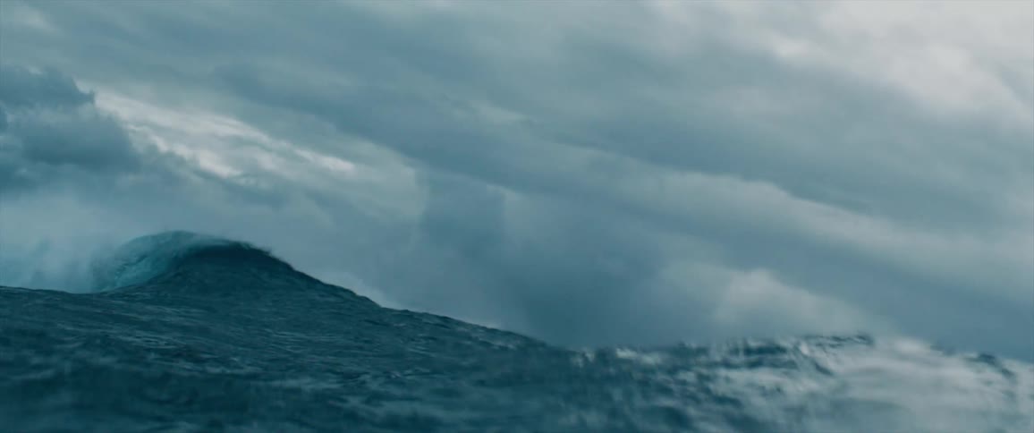 Ocean waves curl and splash as they break