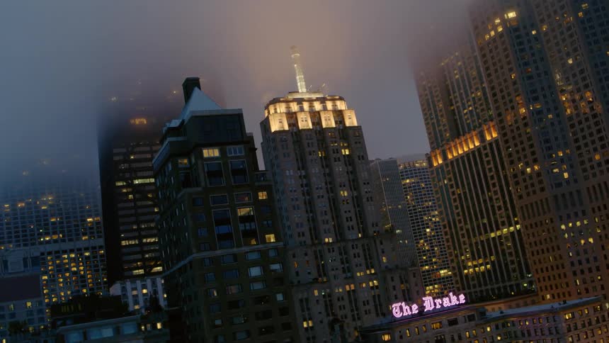 Skyline of Chicago illuminated at night tilted