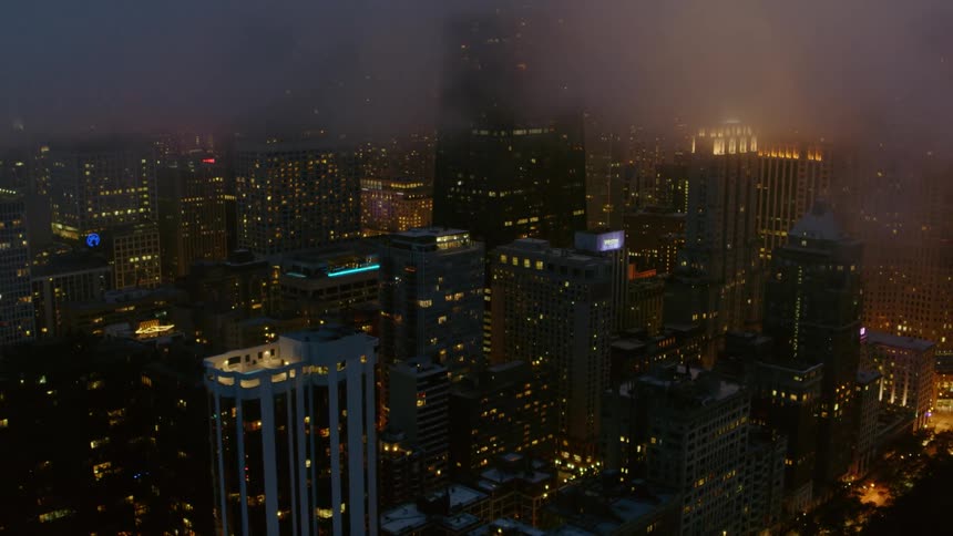 Skyscrapers in Chicago on a foggy night