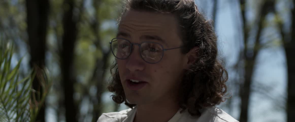 A man talking to other people