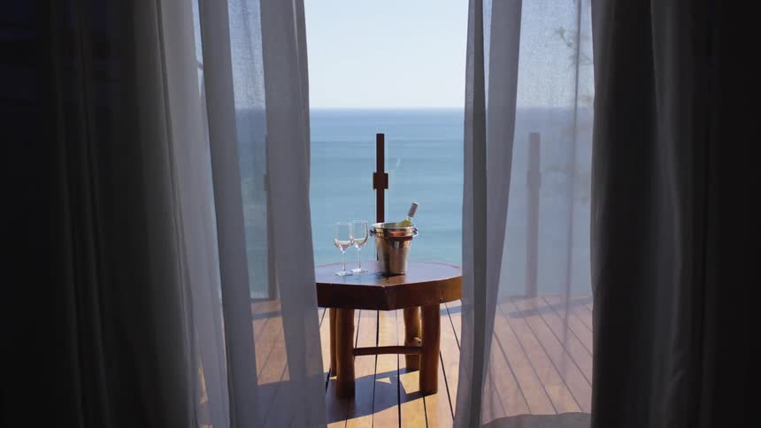 A view out of a window at the ocean
