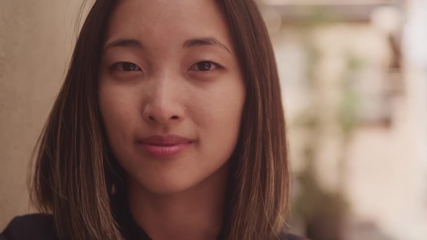 A portrait of an asian woman