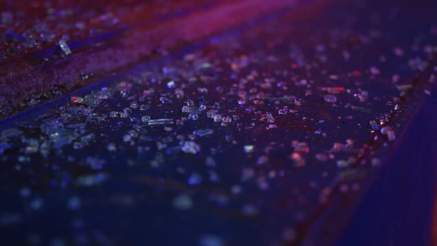 A view of shattered glass on wood