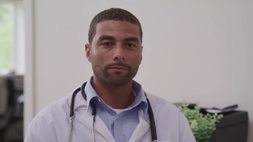 A portrait of a doctor in an office