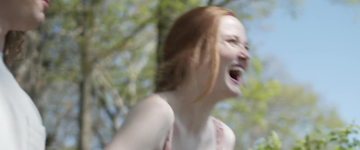 A man and woman talking and laughing