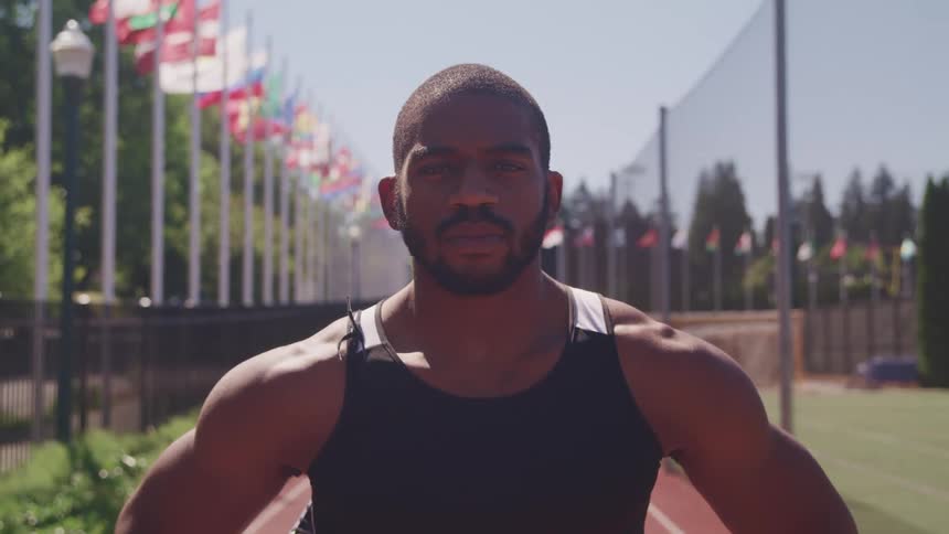 A portrait of a man that is standing outside