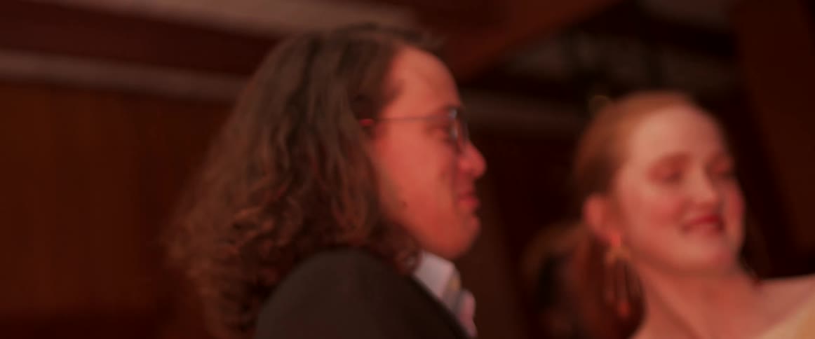 A man and woman dancing at a party