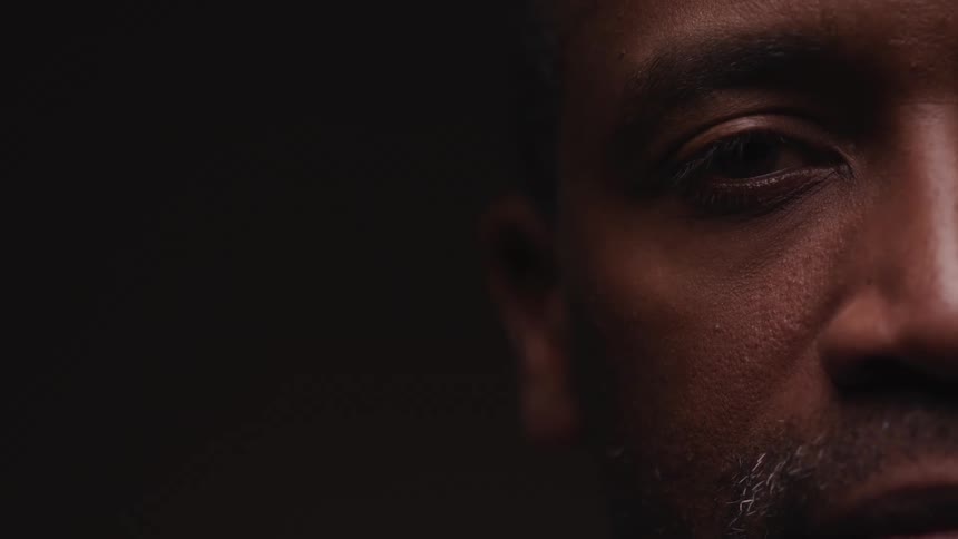 A close up portrait of a mans face
