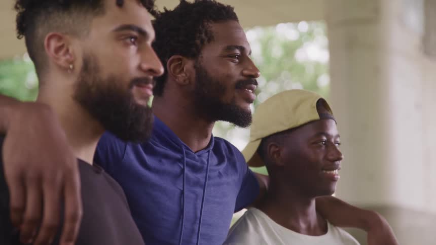 A group of people posing and smiling