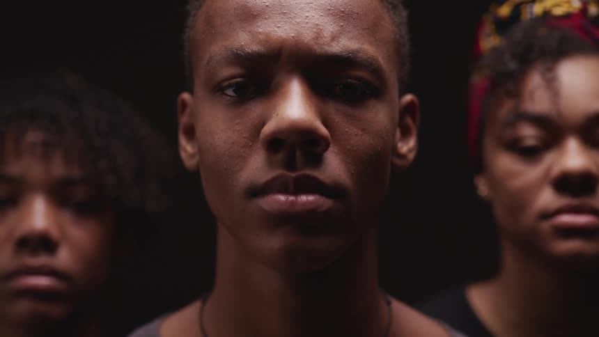 A portrait of three people next to each other