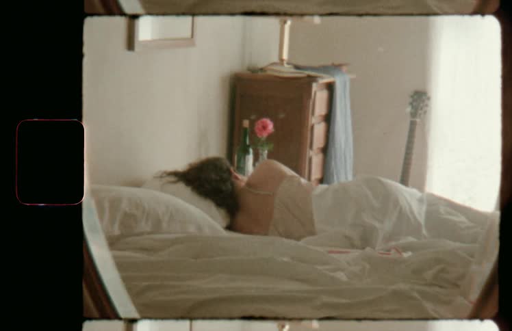 A woman sleeping in bed