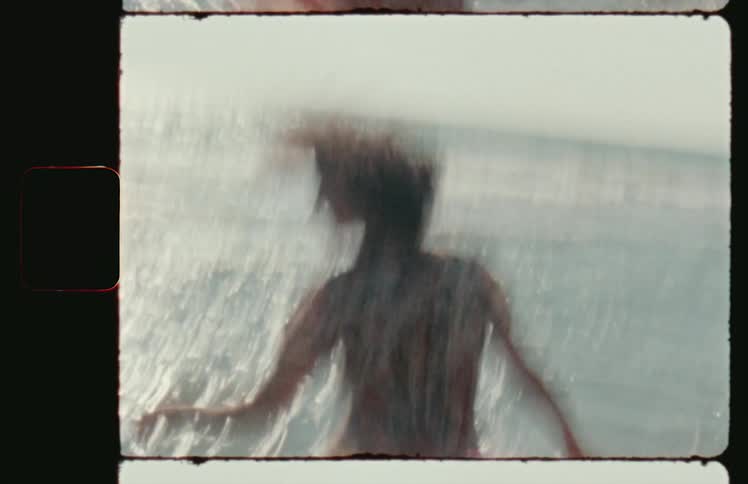 A woman running desperately along a beach