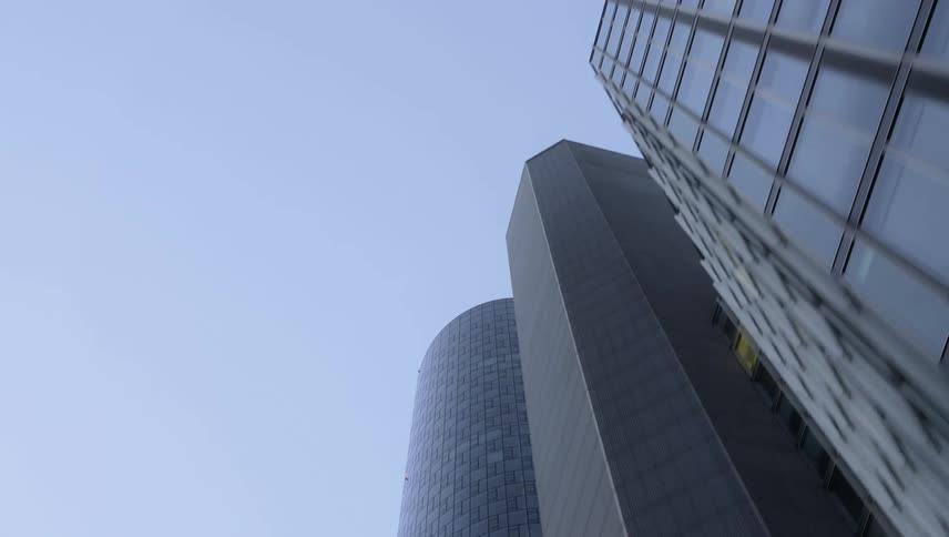 Skyscrapers in a metropolis under a clear blue sky