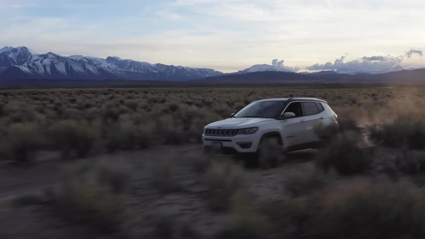 A vehicle driving off road outdoors