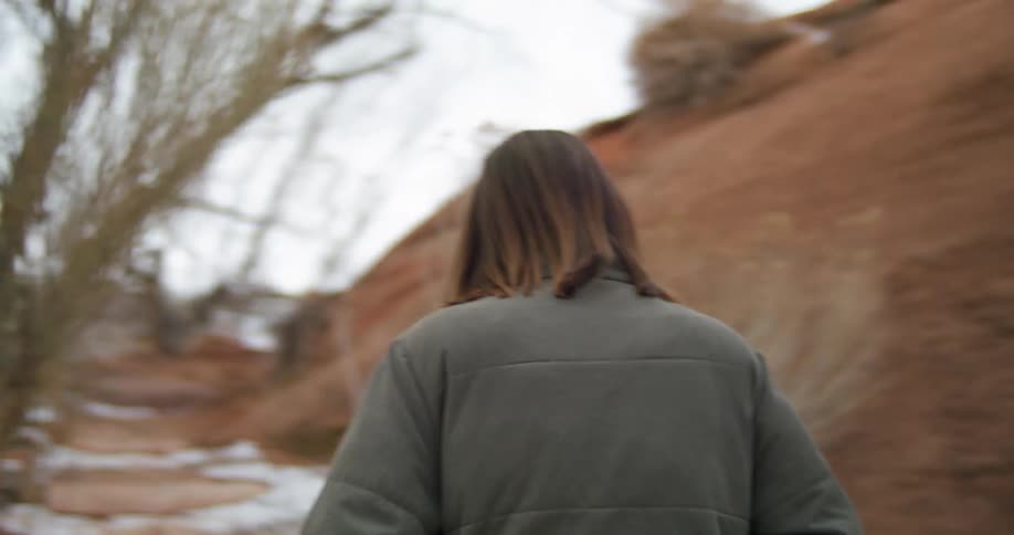 A woman hiking outdoors