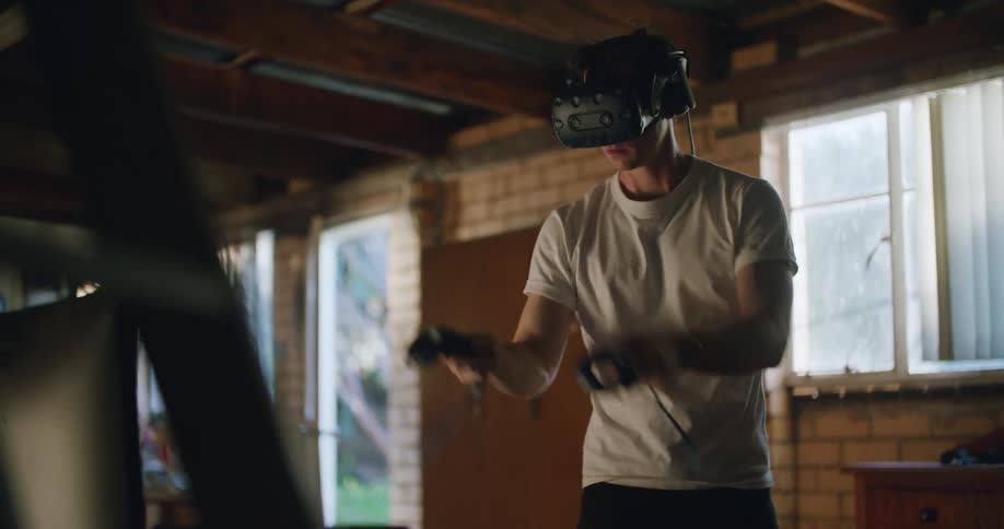 A man using a vr headset in a room