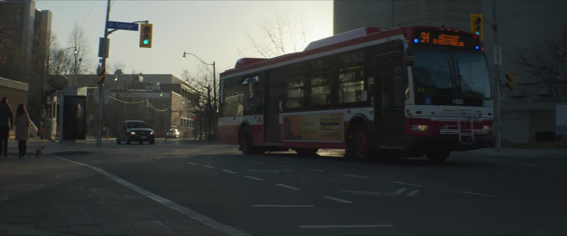A view of cars driving down a road