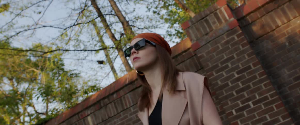 A woman posing for portraits outdoors