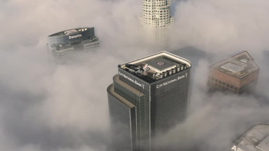 A city with buildings and fog