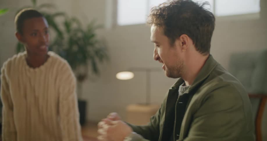 A man and woman working on furniture together