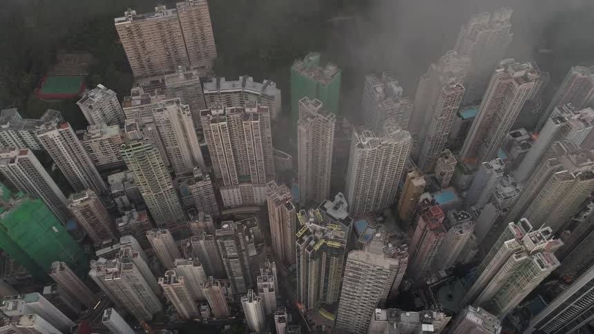 An aerial view of a large city with big buildings