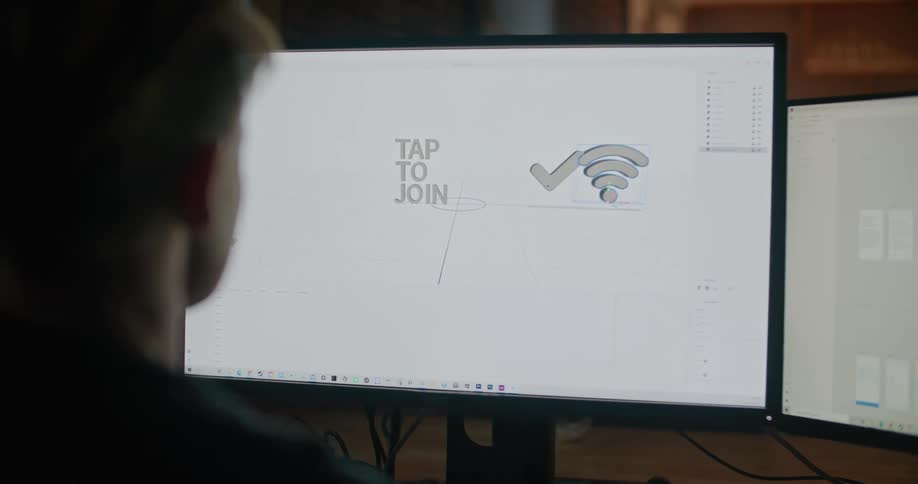 A man working with graphic design software