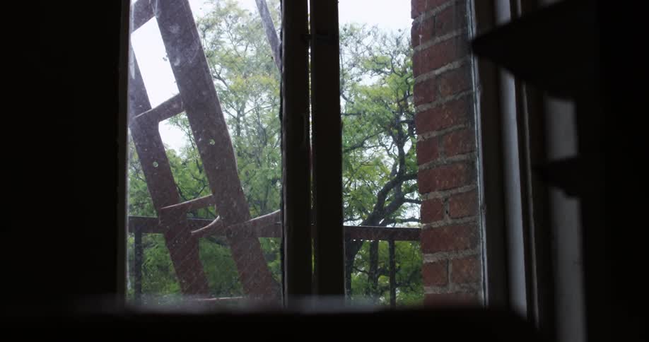 View from inside out of a window to a fire escape