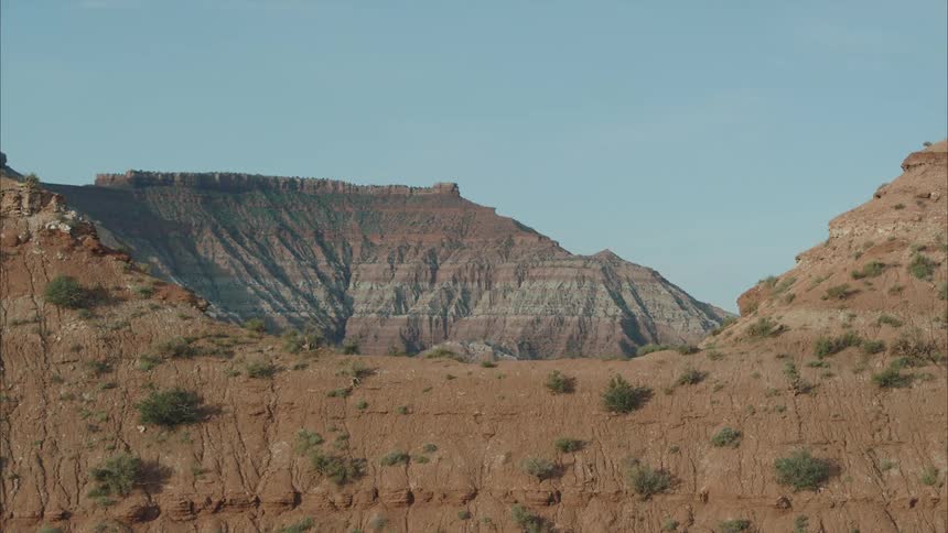 An aerial view of rock formations in a desert landscape