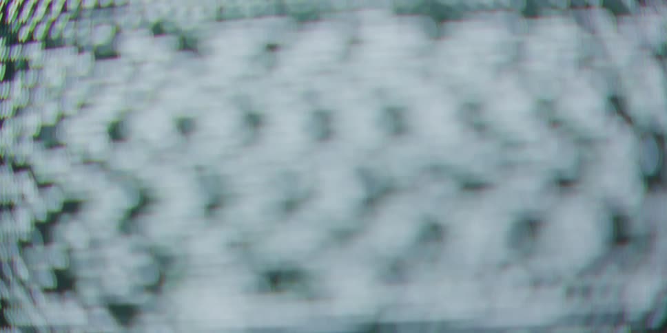 Black and white snow static fills a television screen