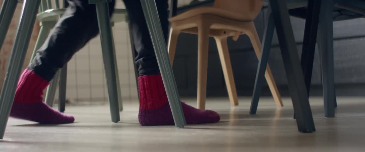 A person sitting down in a chair