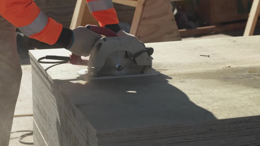 A construction worker is working outdoors