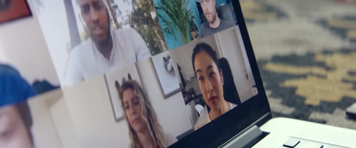 Group of people talking on an online meeting in a laptop