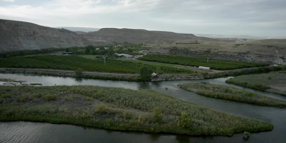 Marsh and farmland as seen from a helicopter in the daytime