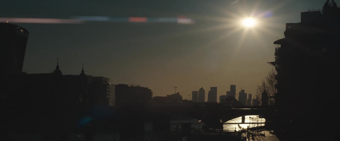 Tall skyscrapers in the city skyline at sunset
