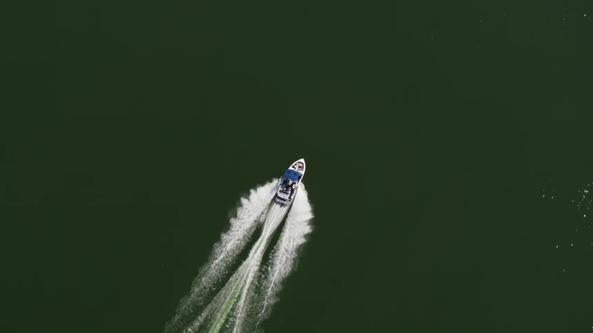 Motor boat moves fast across the water
