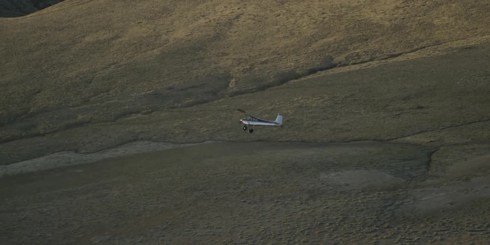 A plane is traveling in the sky