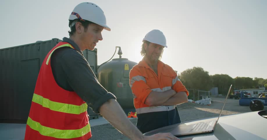 Coworkers working at a job site
