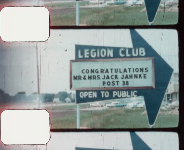 Sign outside an american legion veterans association caught on vintage film