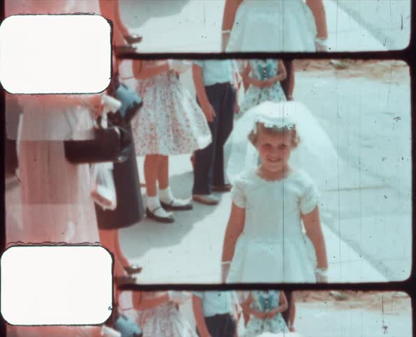 A girl that is standing around outside