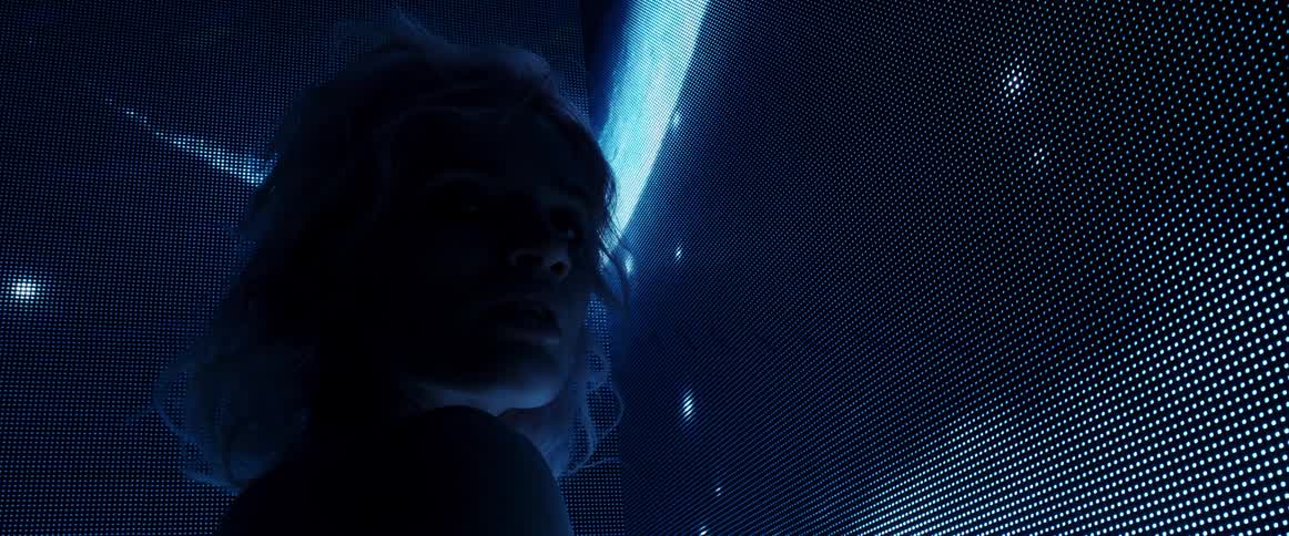 A portrait of a woman at a club
