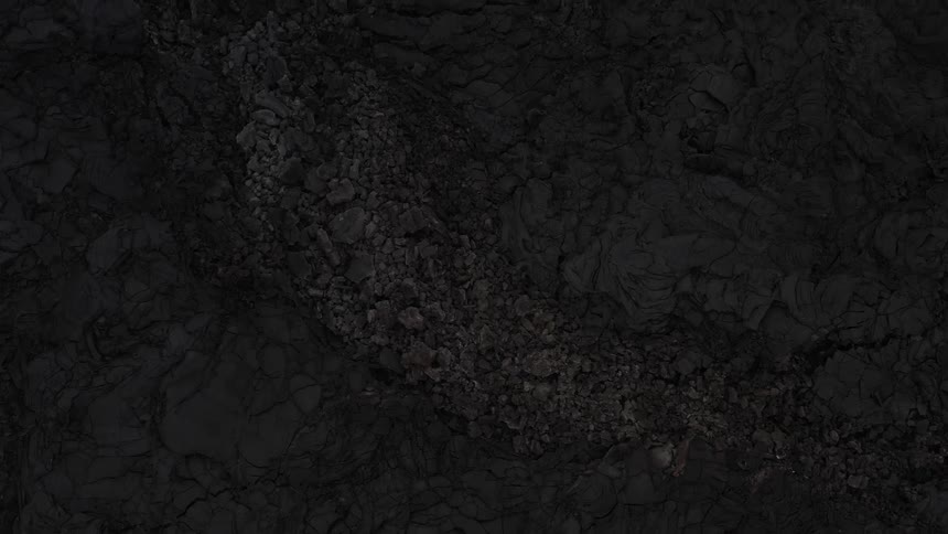 Black gray and white colors that look like dirt and rocks