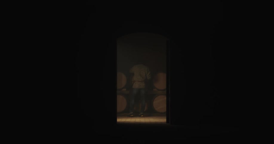 A man with a leather apron in a room with wooden barrels with a wall in the background and a doorway in the foreground